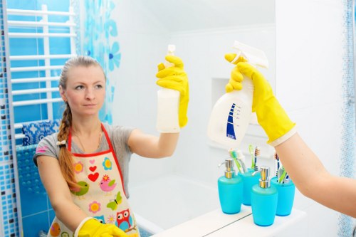 Carpet cleaning technician preparing equipment before a booked service